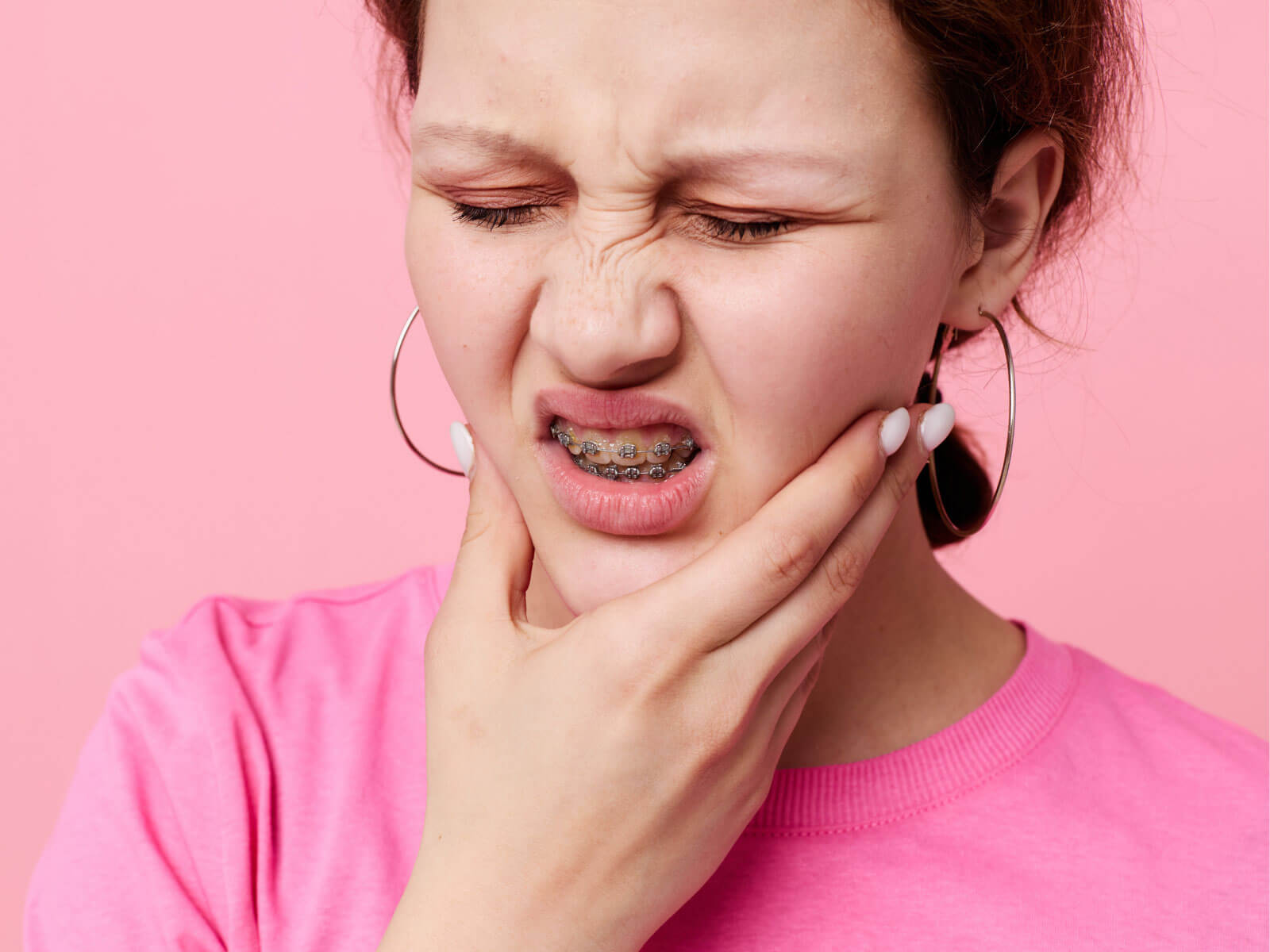 Do Braces Hurt? What to Expect & How to Ease the Pain